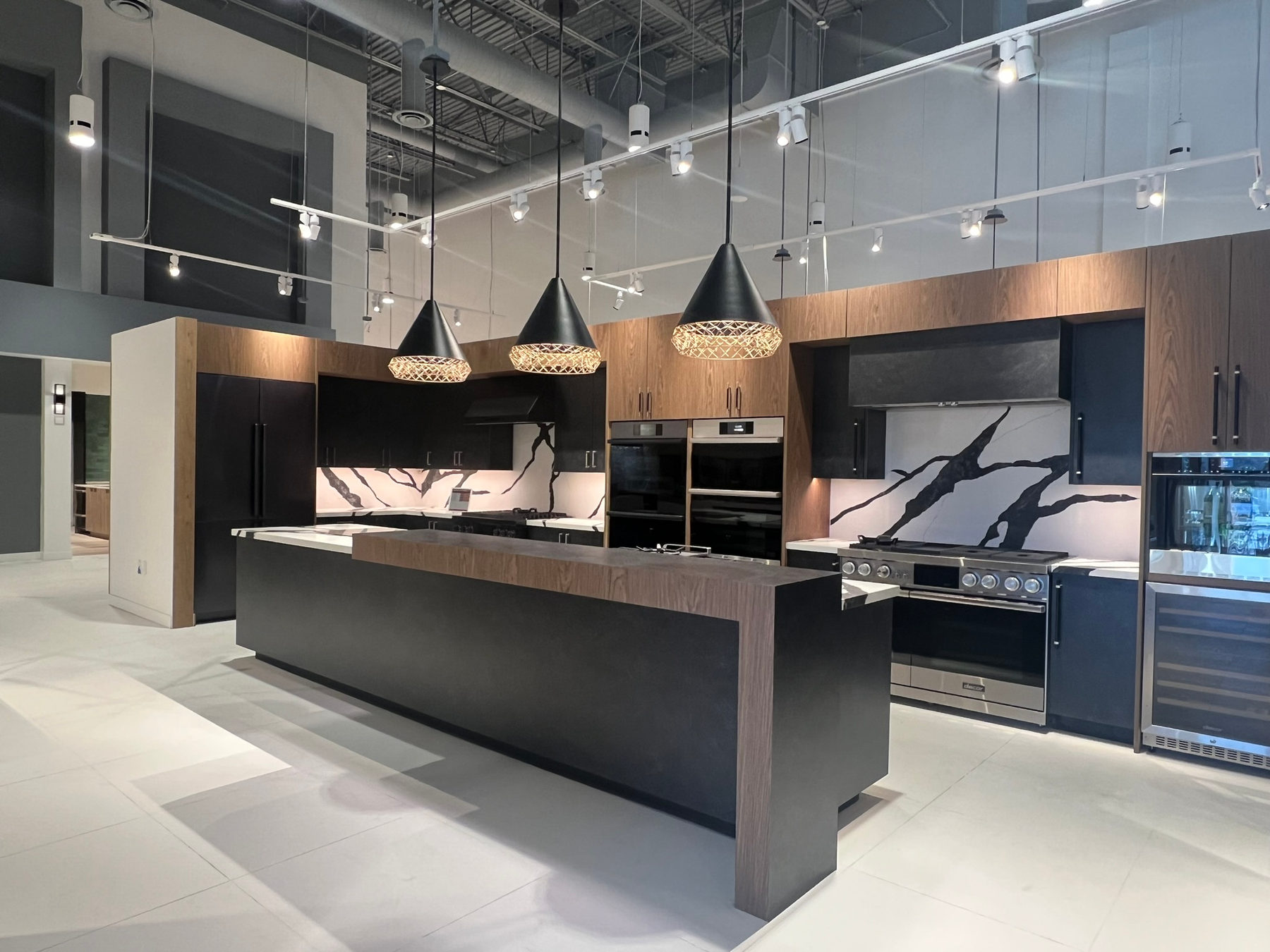 Pendant and track lighting over a kitchen vignette at WDC La Quinta