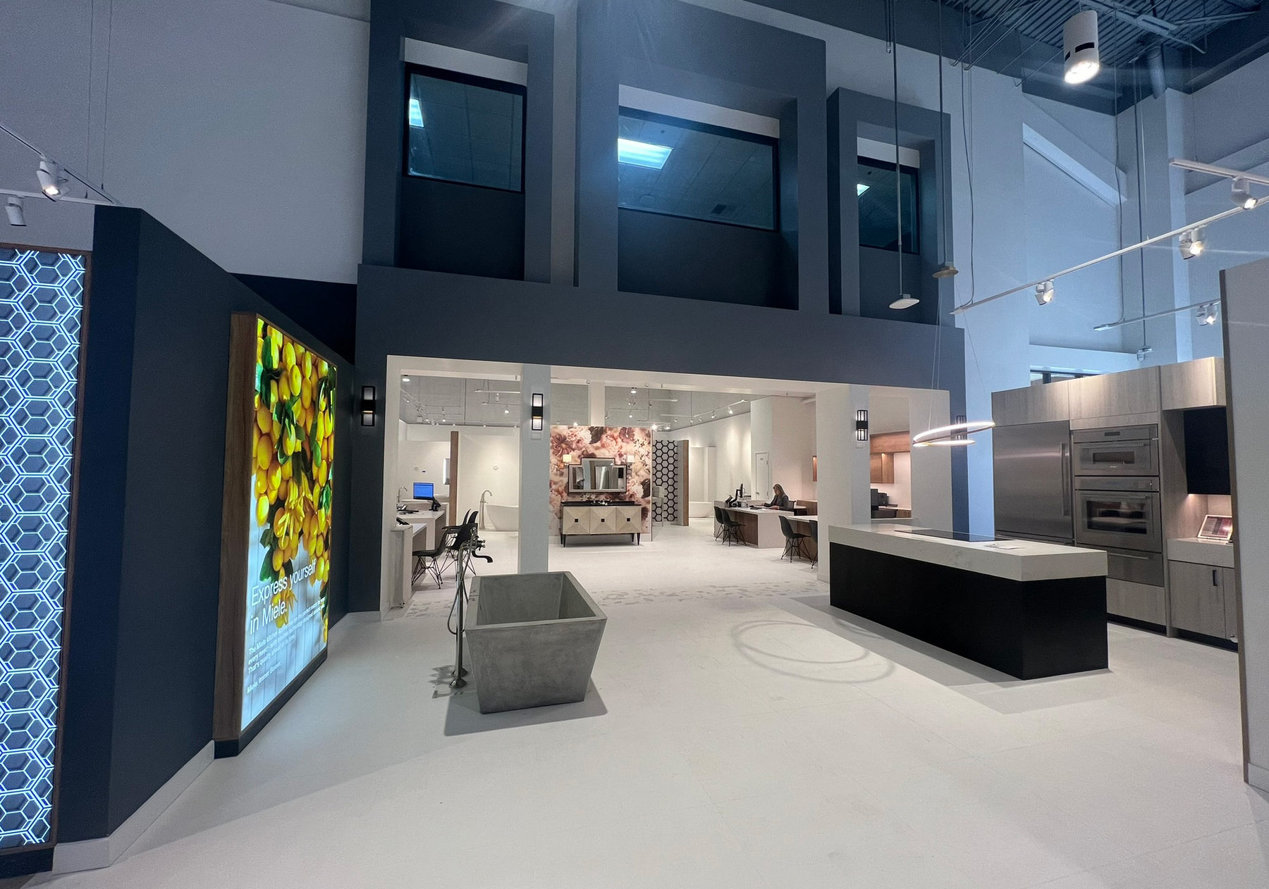 Plumbing gallery entrance at WDC La Quinta with large-format displays and architectural lighting