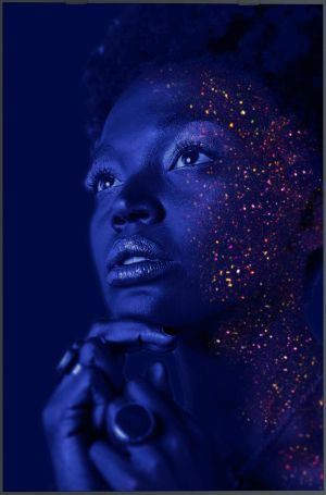 Woman with glitter in her face