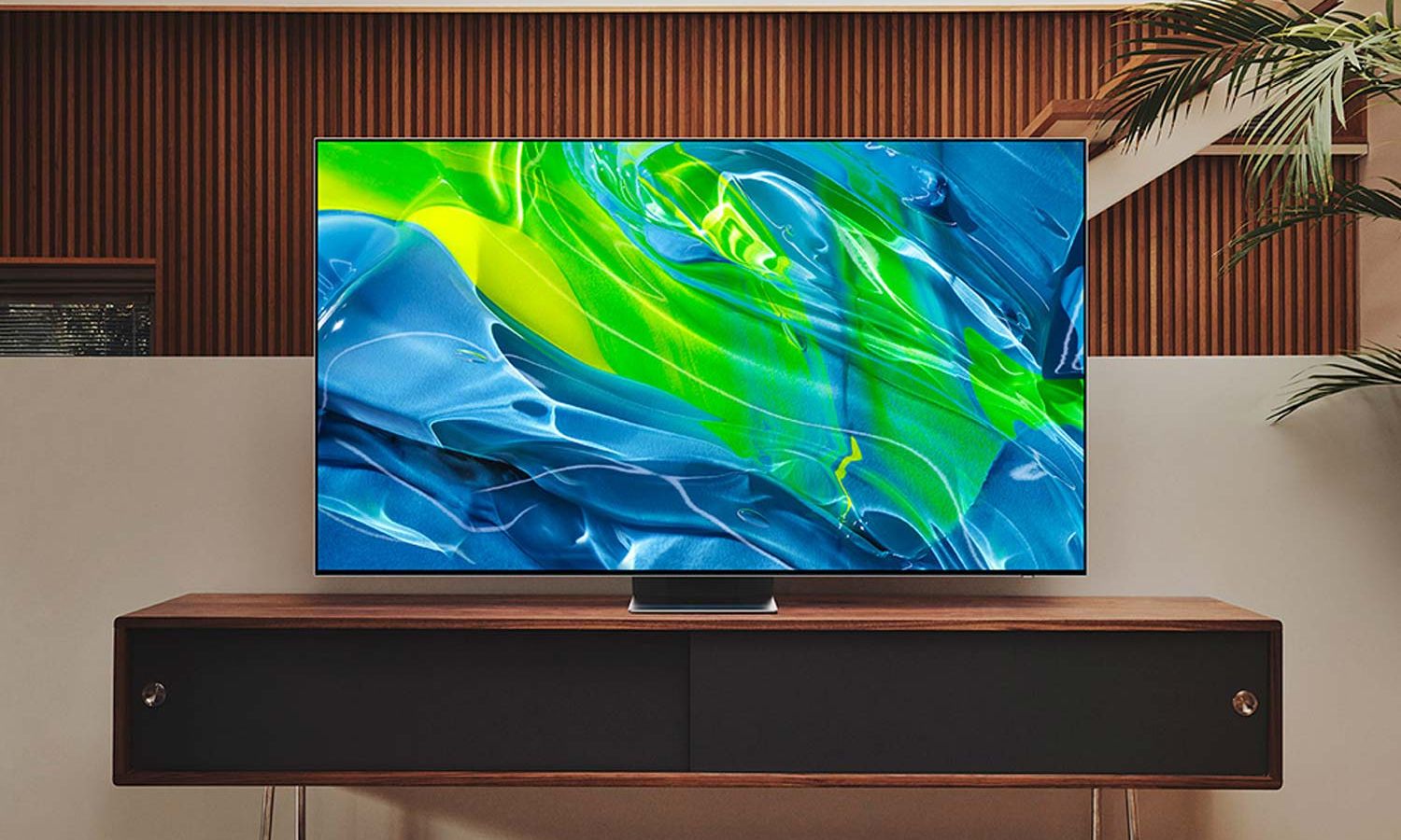 Samsung TV in a modern black and wood furniture