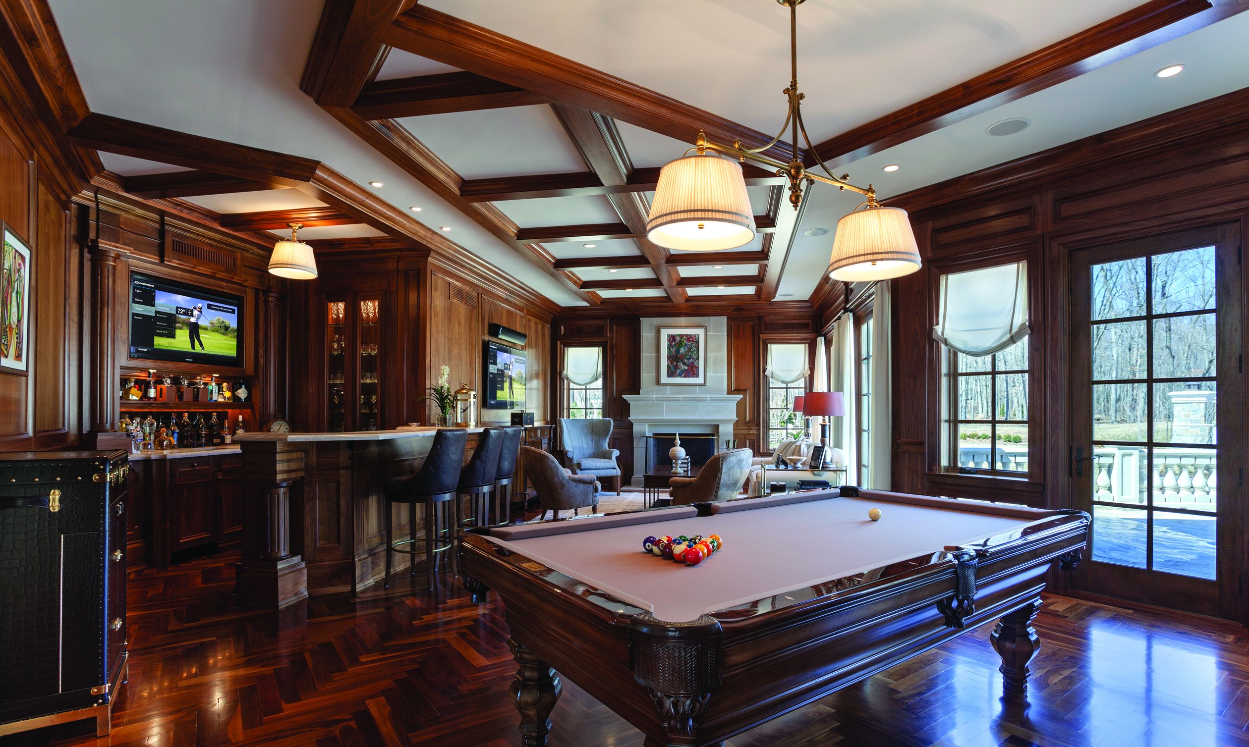 Wooden bar and game room with Crestron Technology